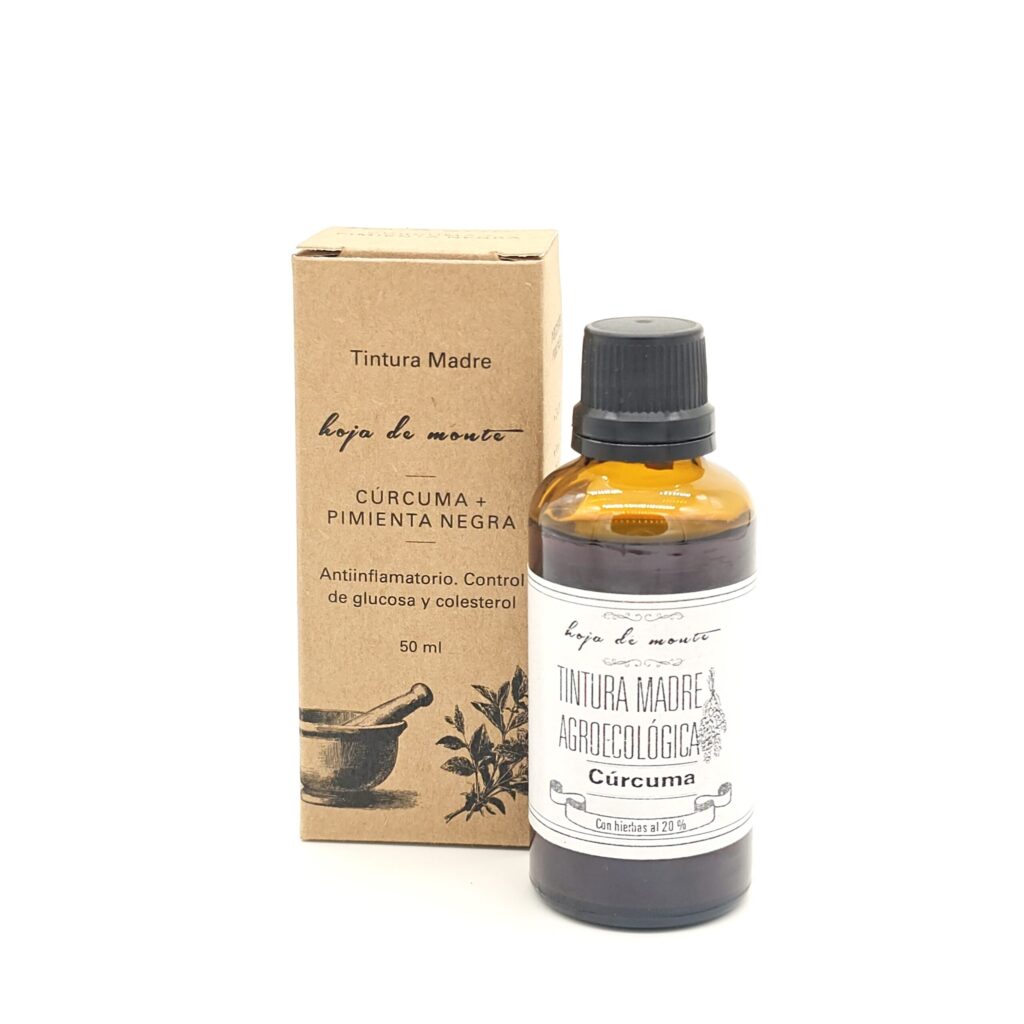 Frasco de tintura madre de curcuma con pimienta, es de vidrio color ambar y esta al lado de su caja color marron estampada